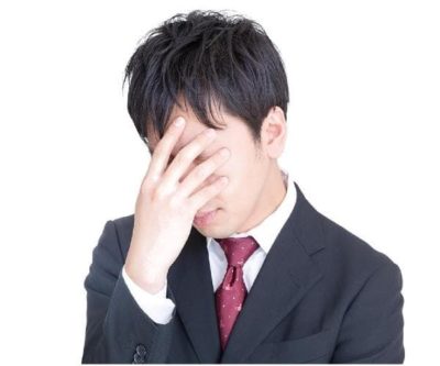 悩む人